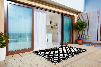 terasový koberec Kolesá v dlaždice